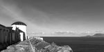 A black and white of Clare Island Lighthouse towards the Atlantic Ocean. 