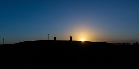 The sun rises above the Hill of Tara on a February morning.